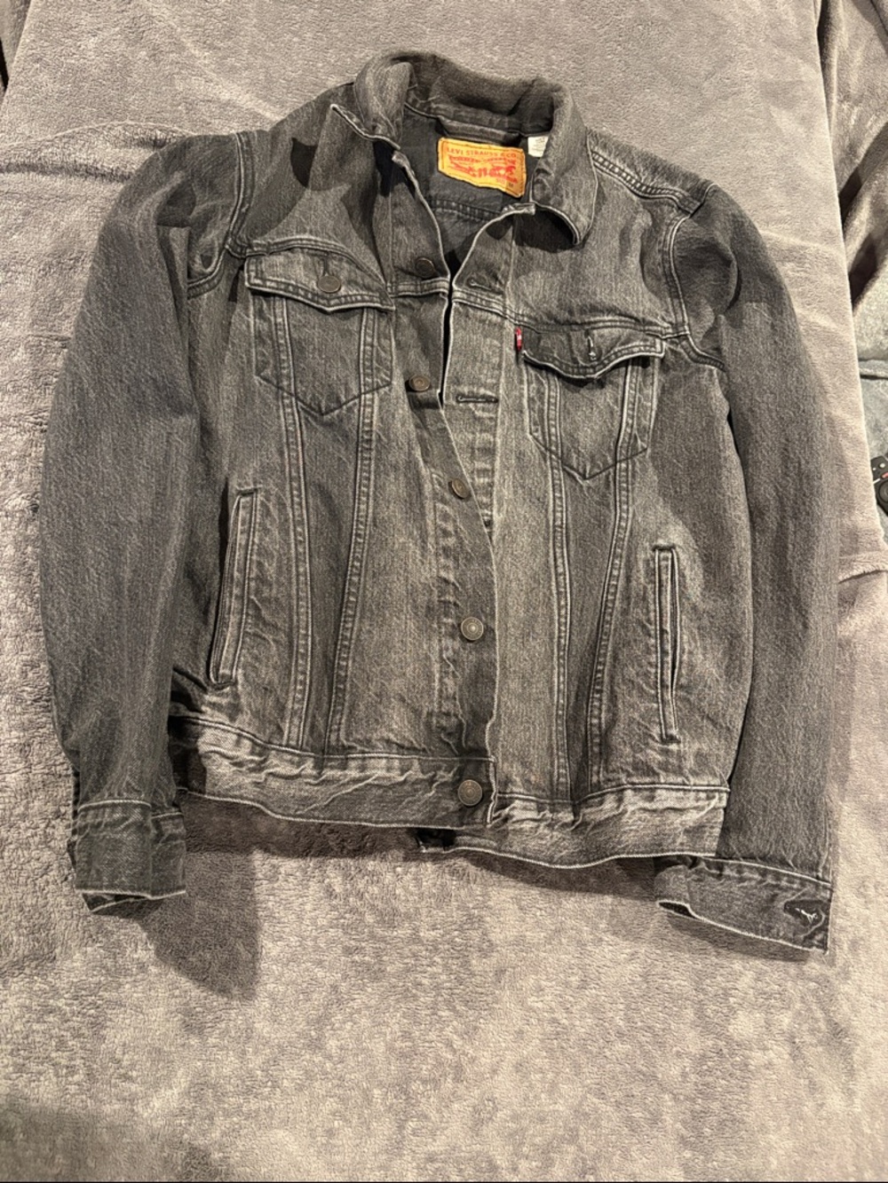 Levi's Faded Black Denim Trucker Jacket